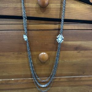 Long multi-strand crystal necklace